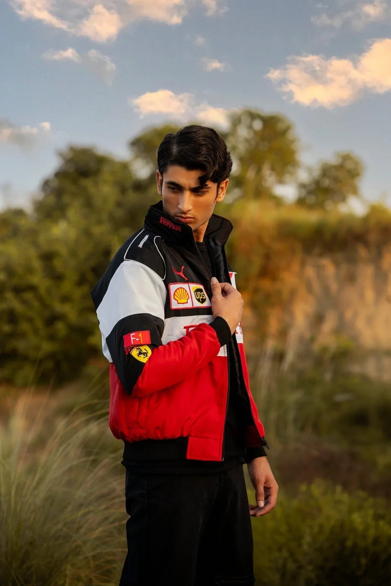 Koti Apparels Formula 1 Ferrari racing jacket in red, white, and black polyester with embroidered logos and a windbreaker style.