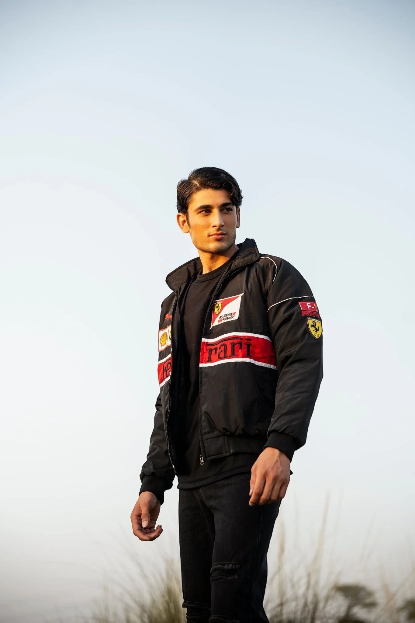 Koti Apparels black F1 Ferrari racing jacket with red and white accents, featuring embroidered logos and a windbreaker material.