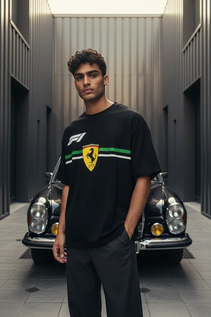 Koti Apparels black cotton Formula 1 t-shirt with Ferrari Prancing Horse logo and green/white stripe detail.