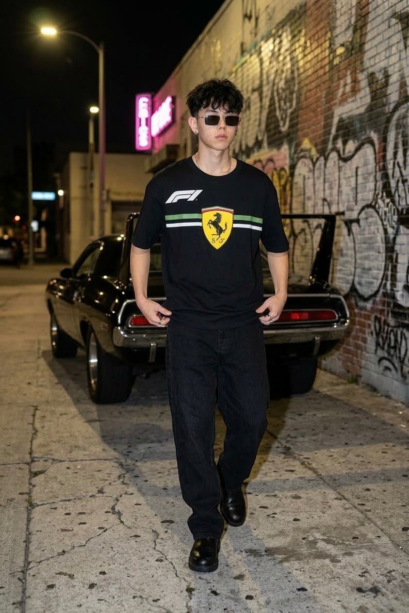 Koti Apparels black cotton Formula 1 Ferrari t-shirt with Prancing Horse logo and green/white stripe detail.