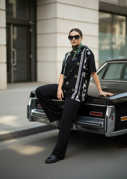 Koti Apparels black cotton blend t-shirt with graphic print, relaxed fit, bandana and floral motifs.