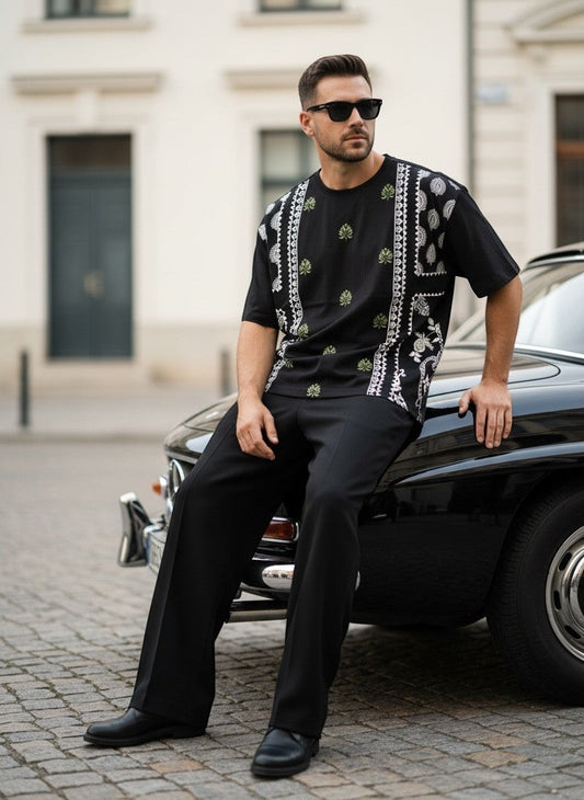 Koti Apparels black cotton blend t-shirt with bandana and floral graphic print, relaxed fit.