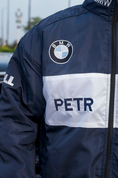 Koti Apparels navy blue BMW racing jacket featuring detailed embroidered logos and a white chest stripe