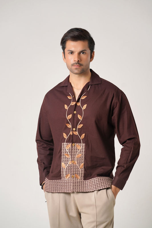 Koti Apparels unisex brown khaddar shirt with leaf embroidery on the front placket and geometric hem.
