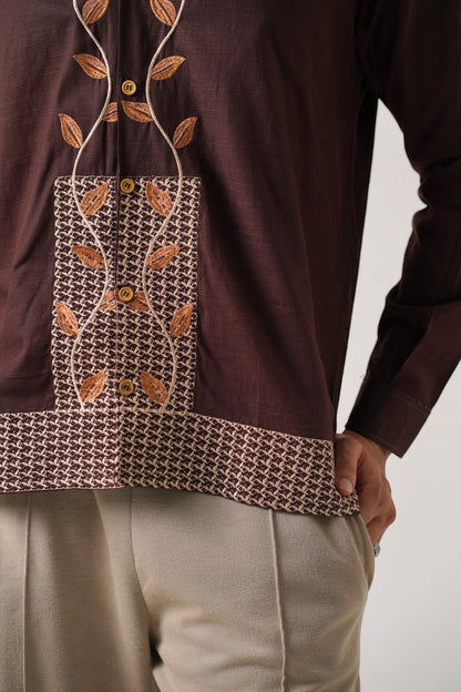 Koti Apparels brown unisex khaddar shirt with intricate leaf embroidery on the front placket and cuffs. Relaxed fit.