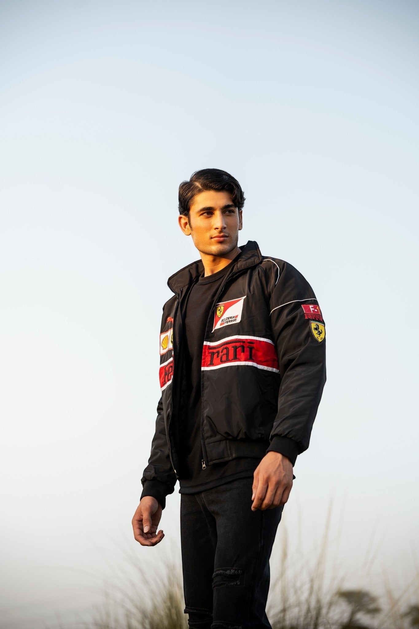 Koti Apparels black vintage Formula 1 racing jacket with red and white stripe detail and embroidered logos.