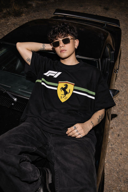 Koti Apparels black Formula 1 Ferrari t-shirt with Prancing Horse logo, F1 branding, and green/white stripe detail.