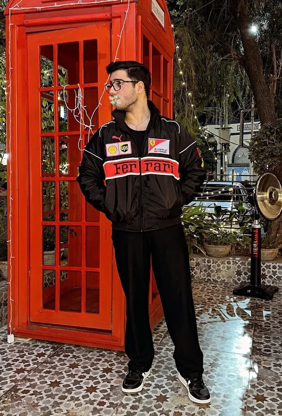 Koti Apparels black vintage Y2K Formula 1 racing jacket with red and white accents, featuring embroidered logos.