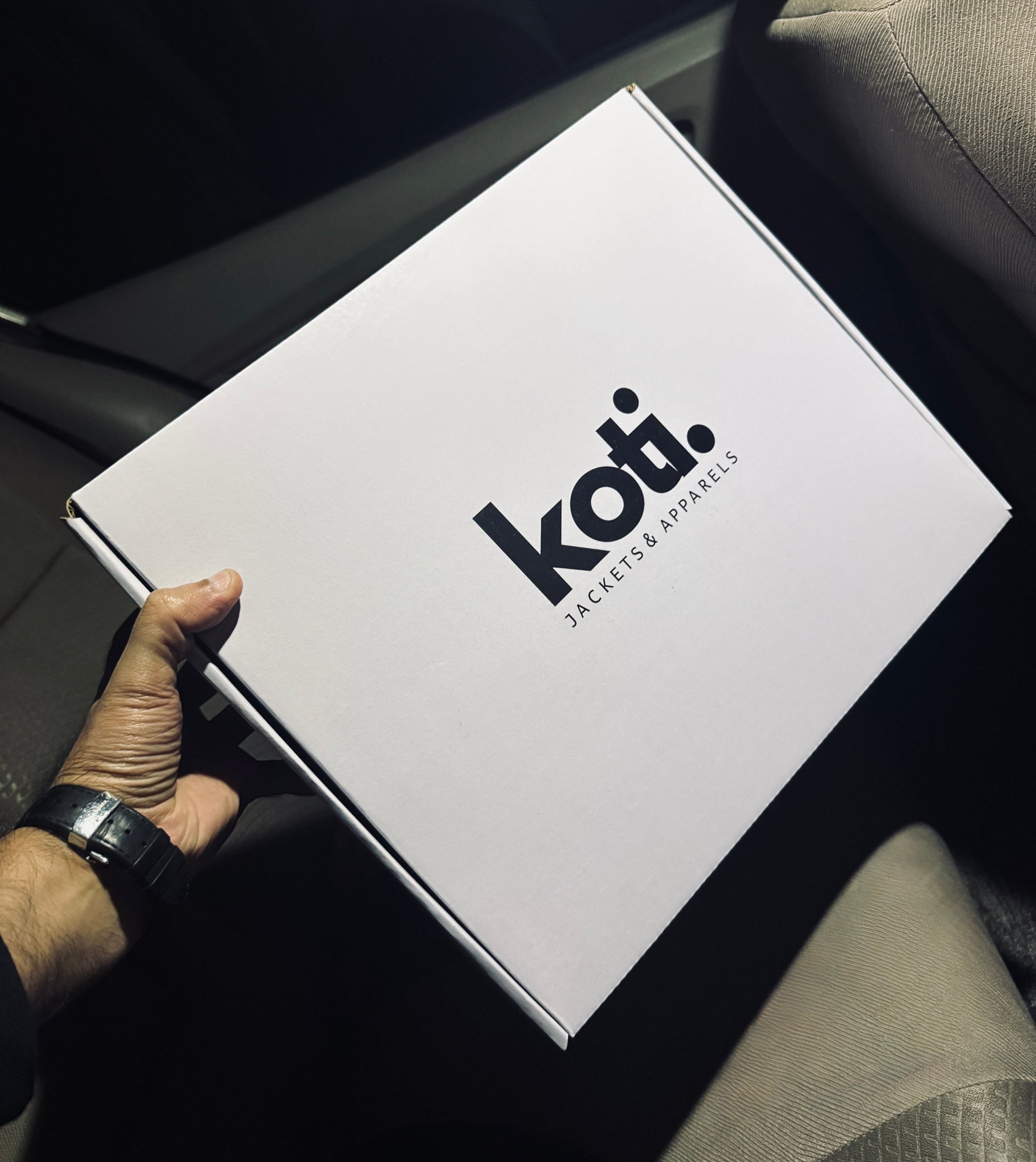 Koti Apparels white gift box with black logo, includes gift ribbon and box for packaging.