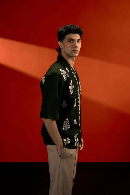 Koti Apparels unisex dark green cotton jacquard shirt with white floral embroidery and quarter sleeves.