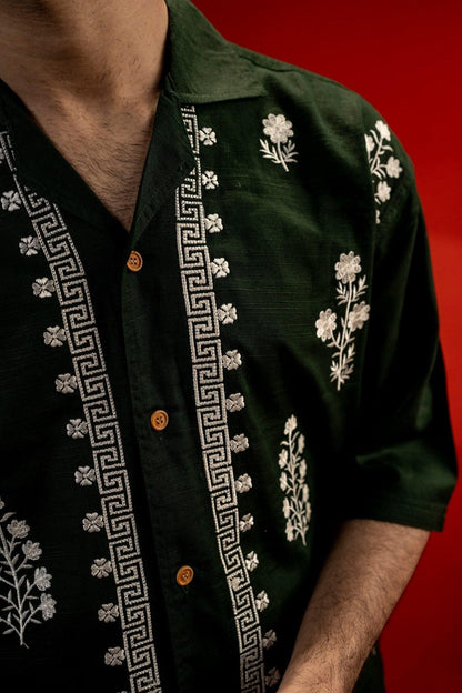 Koti Apparels unisex dark green cotton jacquard shirt with white floral embroidery and Greek key trim.