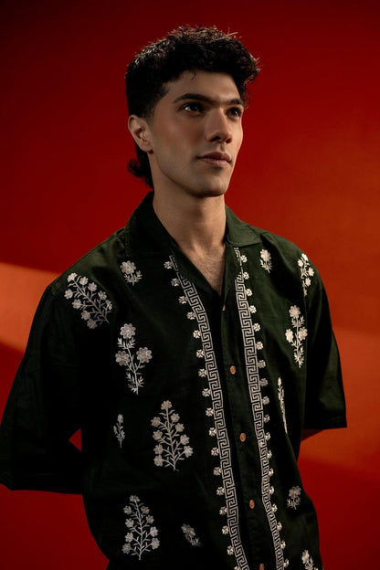Koti Apparels unisex dark green cotton jacquard shirt with white floral embroidery and quarter sleeves.