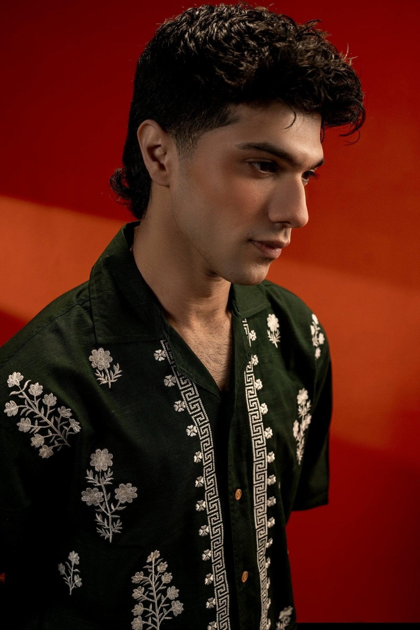 Koti Apparels unisex dark green cotton jacquard shirt with white floral embroidery and quarter sleeves.