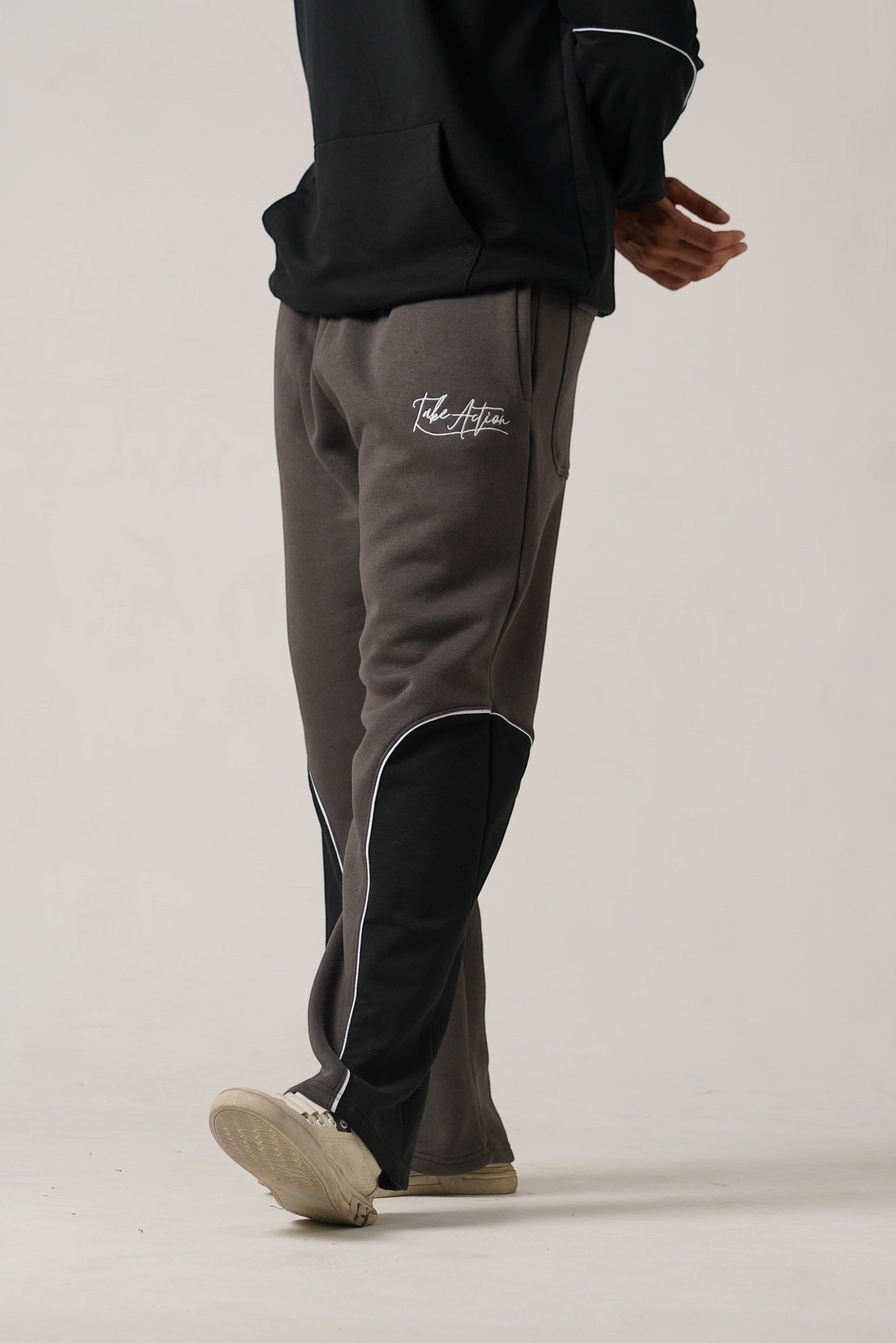 Koti Apparels heavyweight unisex winter fleece trousers in charcoal grey with black side panels and white piping, embroidered logo.