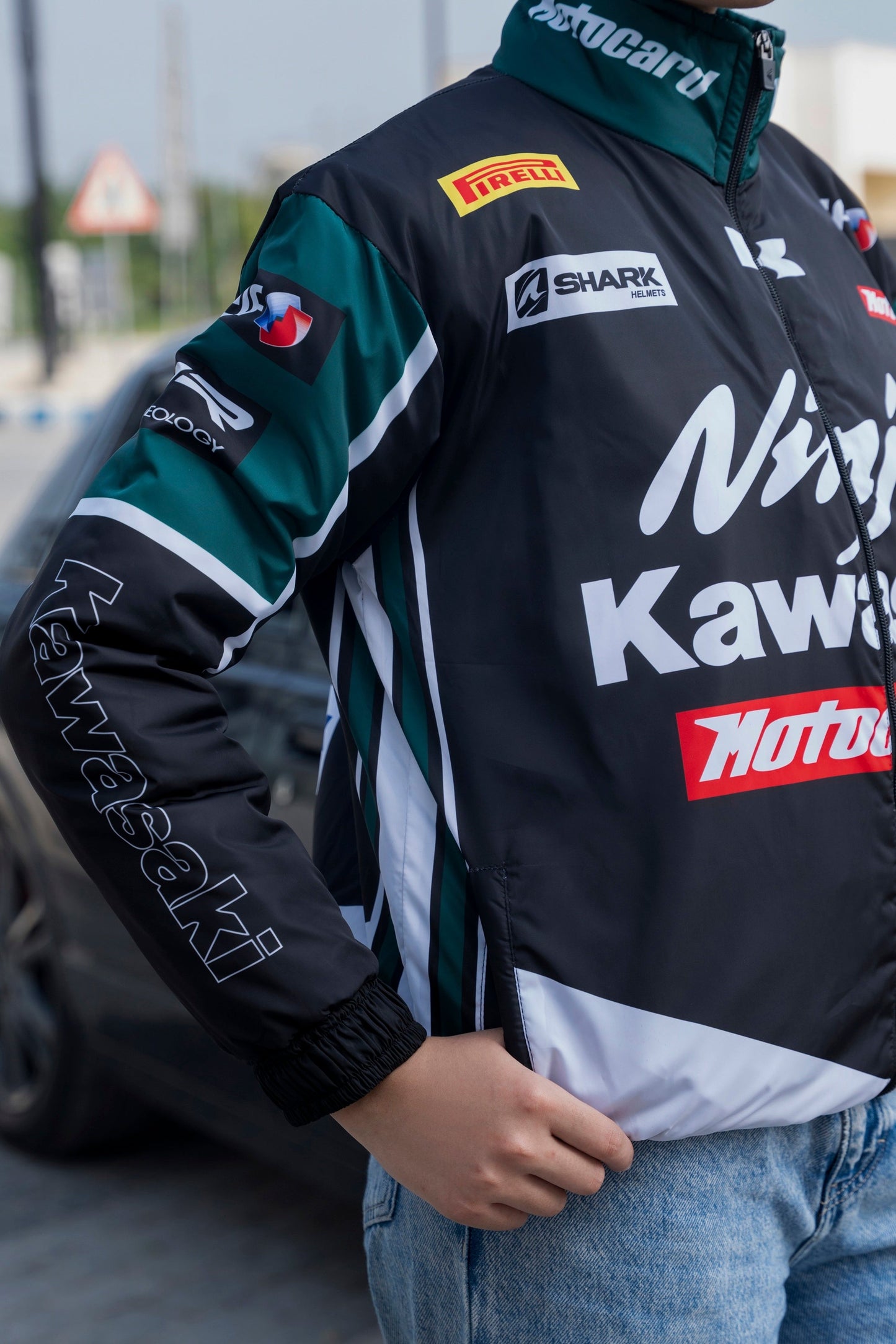 Koti Apparels Kawasaki racing jacket in black and green polyester with sponsor logos and zip-up front