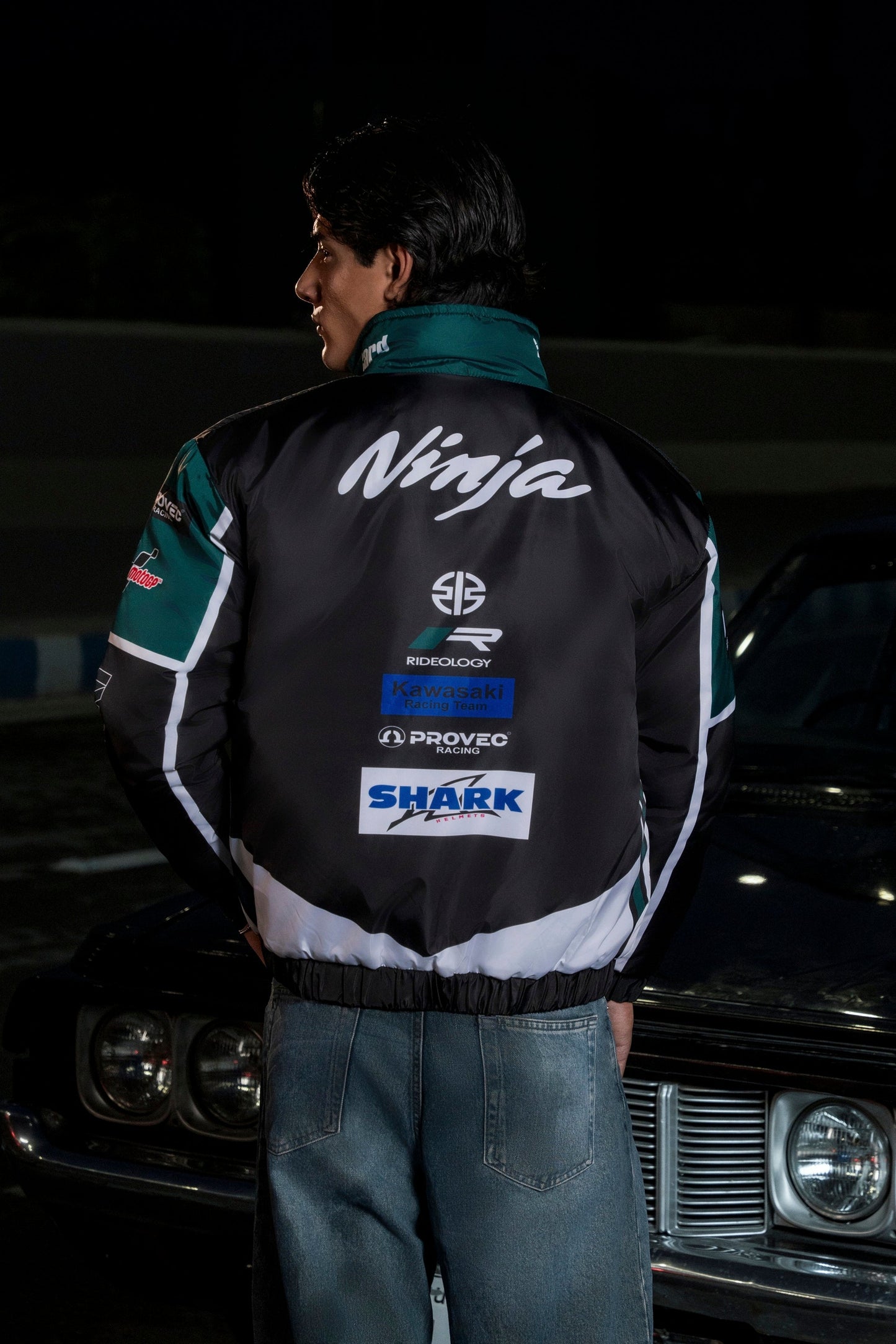 Koti Apparels Kawasaki racing jacket in black and green polyester with Ninja branding and sponsor logos on the back