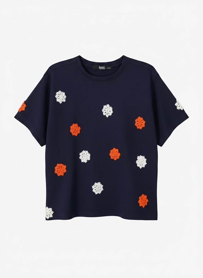 Koti Apparels navy blue short sleeve t-shirt with embroidered orange and white floral appliques.