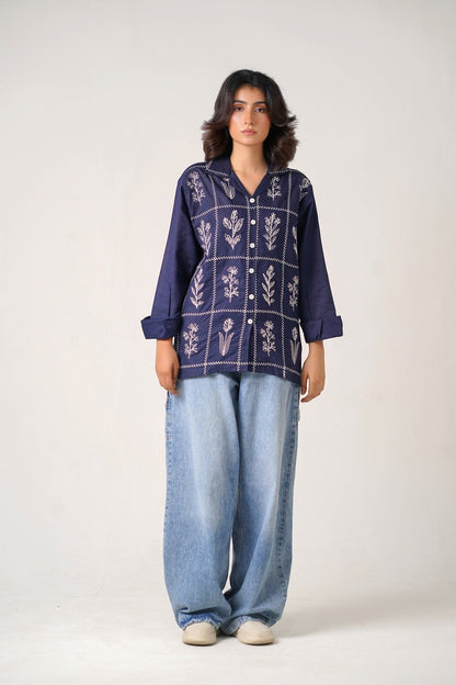 Koti Apparels navy blue cotton khaddar unisex shirt with ivory-white floral embroidery in geometric panels, open collar, button-down front.