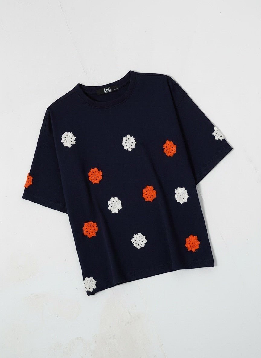 Koti Apparels navy blue t-shirt with short sleeves and crew neck, featuring embroidered orange and white floral appliques.