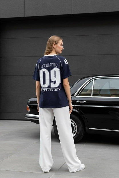 Koti Apparels navy blue cotton t-shirt with white graphic print and contrast piping on raglan sleeves.