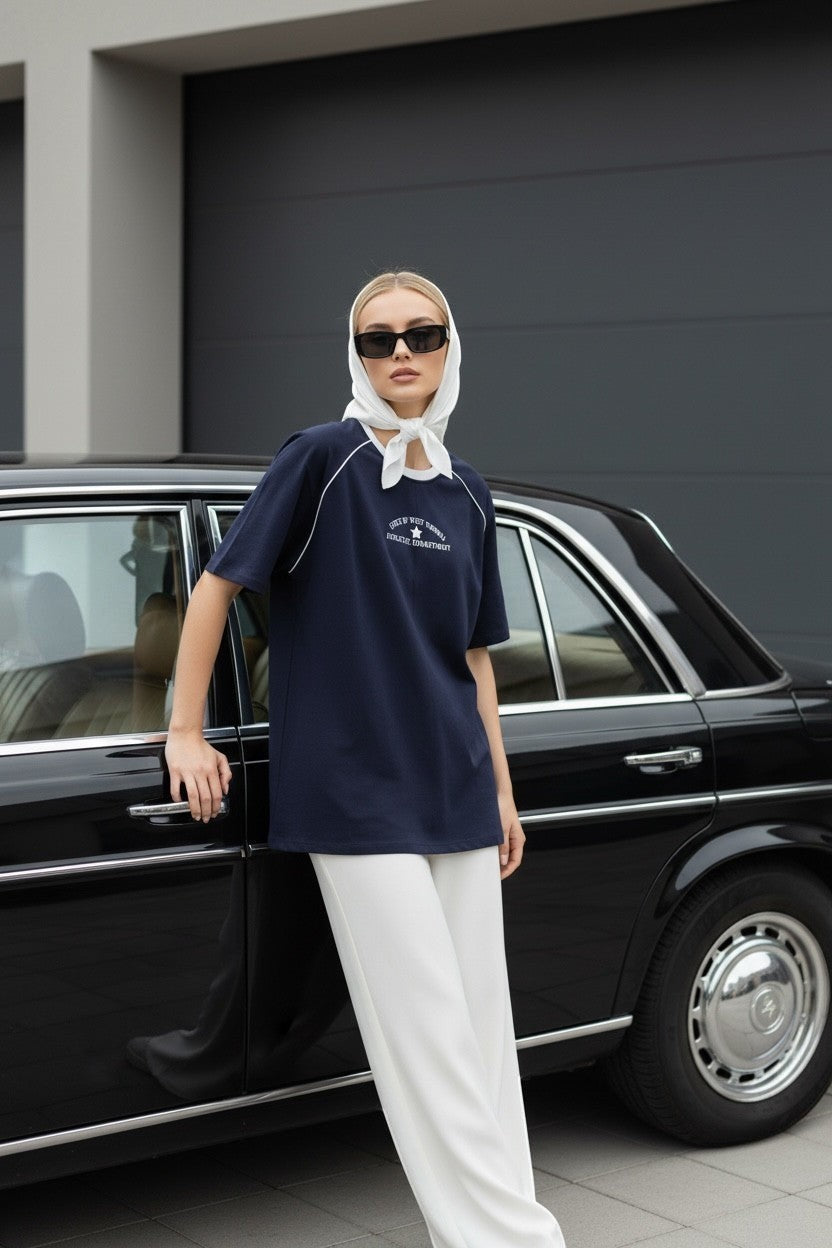 Koti Apparels navy blue cotton graphic t-shirt with white piping on raglan sleeves and vintage athletic print.