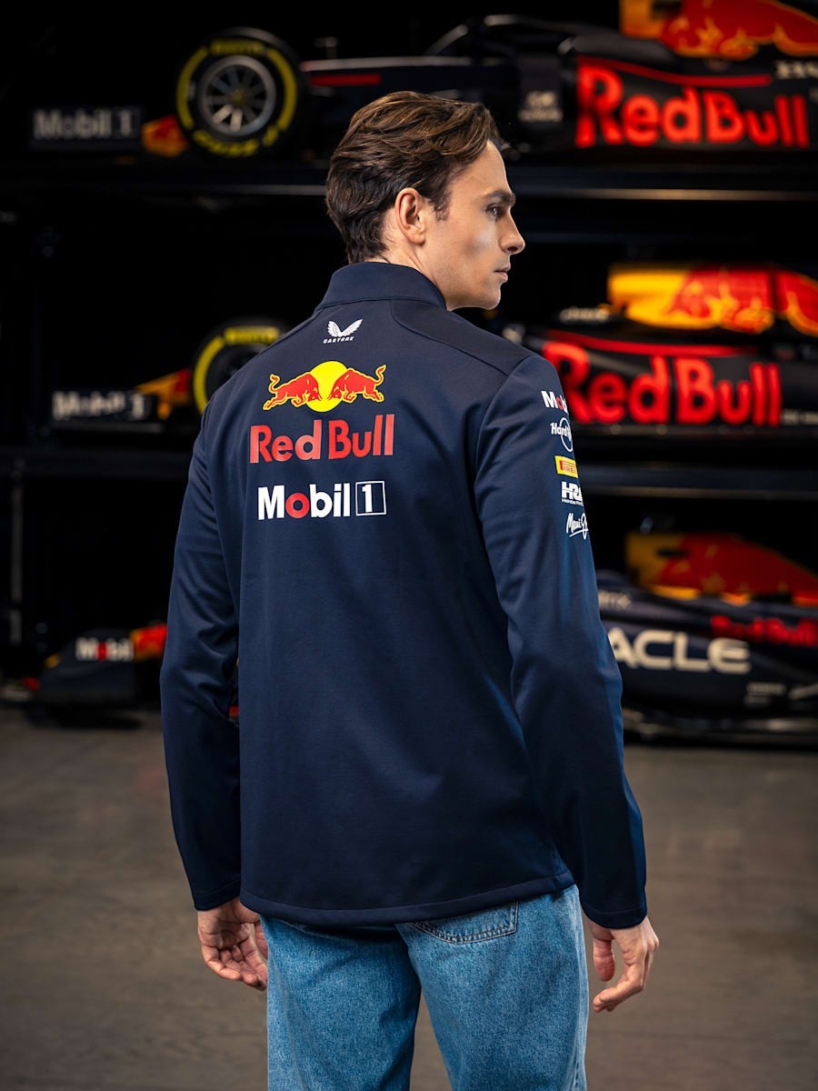 Koti Apparels navy blue polyester Formula 1 racing jacket with Red Bull and partner logos, full zip, and zipped pockets.