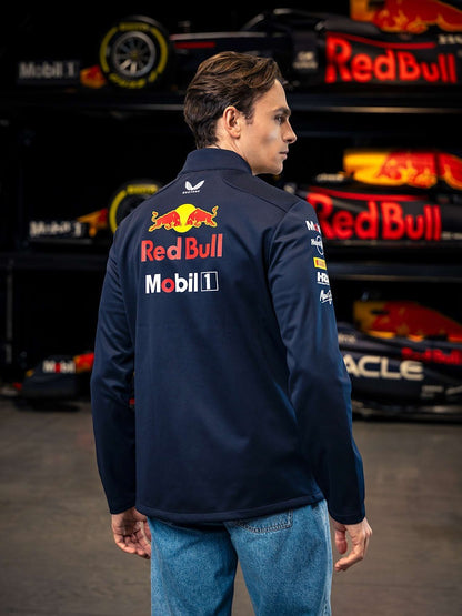 Koti Apparels navy blue polyester Formula 1 racing jacket with Red Bull and partner logos, full zip, and zipped pockets.