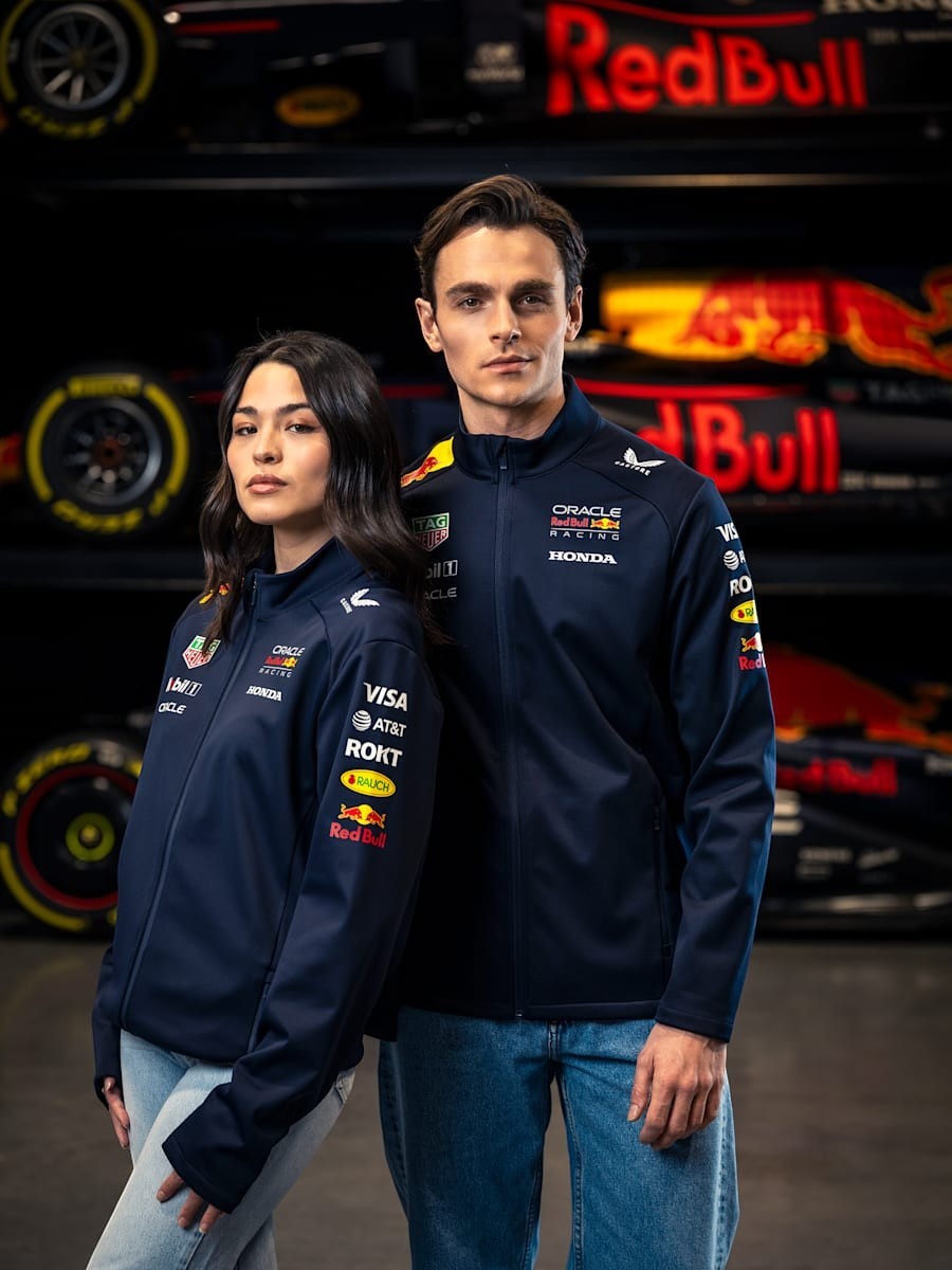 Koti Apparels navy blue polyester Formula 1 racing jacket with Red Bull and partner logos, full zip, zipped pockets, water-resistant.