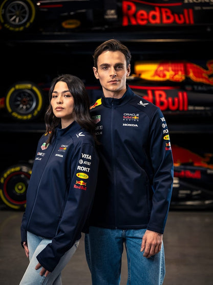 Koti Apparels navy blue polyester Formula 1 racing jacket with Red Bull and partner logos, full zip, zipped pockets, water-resistant.