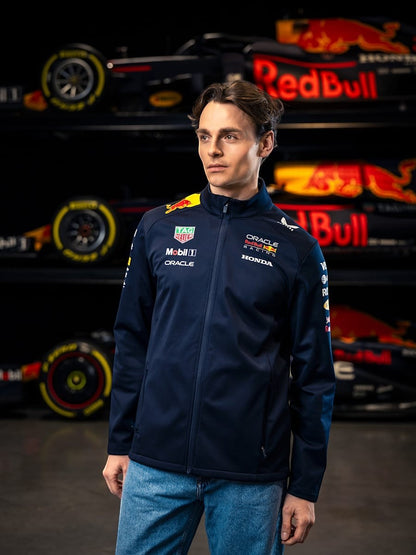 Koti Apparels navy blue polyester Formula 1 racing jacket with Red Bull and partner logos, full zip, zipped pockets, water-resistant.