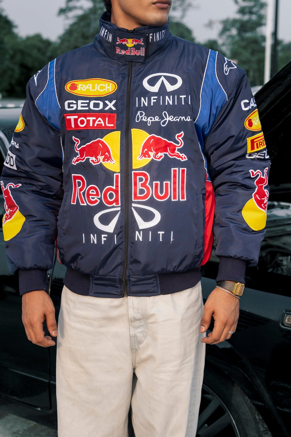 Koti Apparels navy blue Red Bull racing jacket with authentic embroidered sponsor logos and a bold F1 team design.