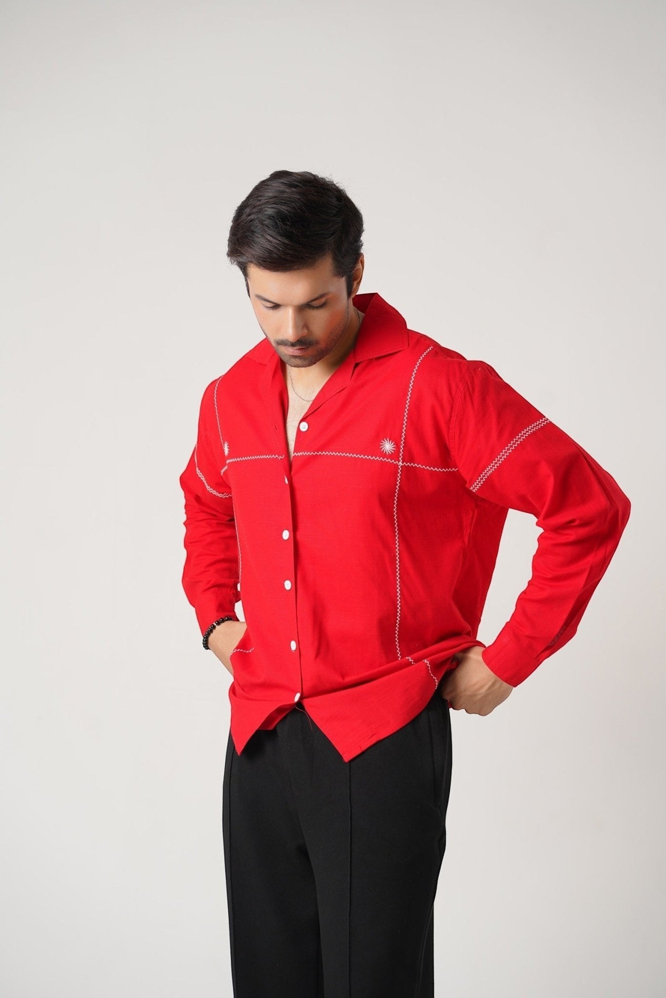 Koti Apparels red 100% pure dyed tube khaddar unisex shirt with white zig-zag embroidery and starburst motifs. Button-down front, open collar, full sleeves.