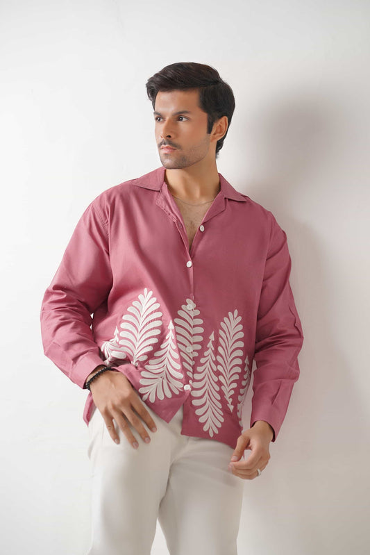 Koti Apparels rose pink unisex shirt with full sleeves and leaf embroidery on the hem. Button-down front, crisp collar.