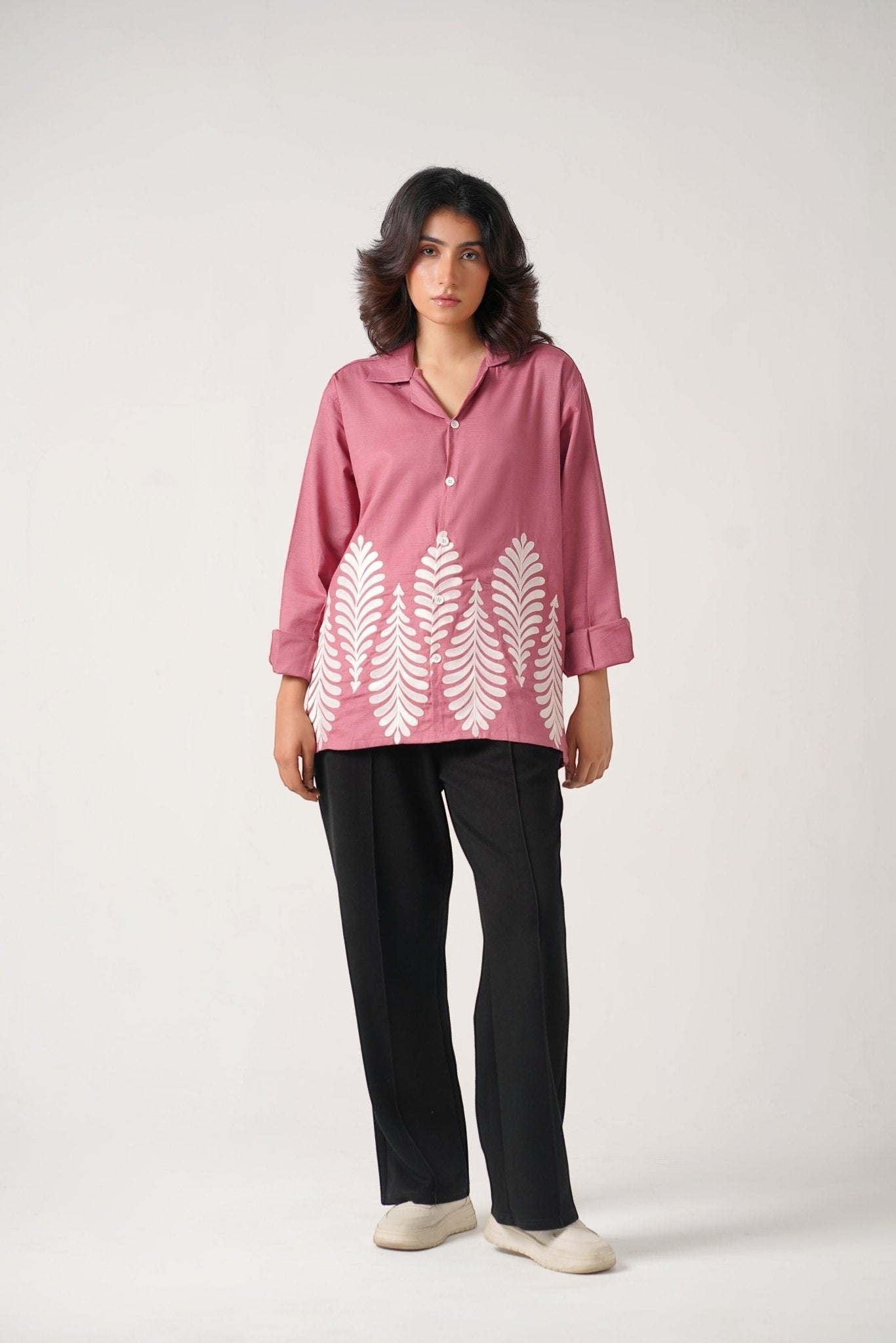 Koti Apparels rose pink unisex shirt with full sleeves and leaf embroidery on the hem. Button-down front, crisp collar.