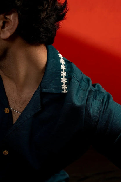Koti Apparels sea green cotton shirt with white floral embroidery on the collar and quarter sleeves. Relaxed fit, unisex design.