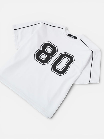 Koti Apparels white cotton blend t-shirt with black "80" graphic and black piping detail.